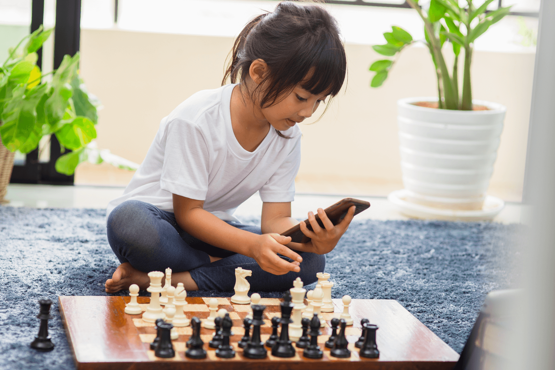 Child playing chess.